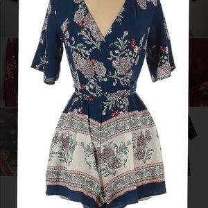 Blue and Pink Floral Romper. Gently Used.
